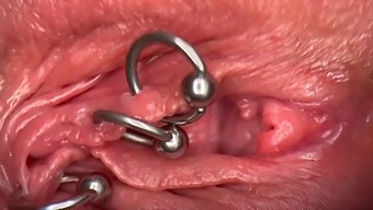Intense Close-Up Of Pierced Clit And Pussy With Wetting