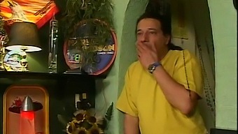 A Blonde Woman Is Double Teamed In A Bar