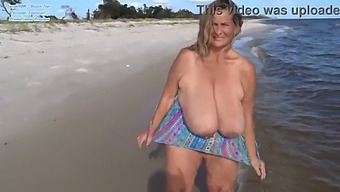 Plump Mature Woman Shows Off Her Curves In Swimsuit On The Beach